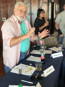 2019 Staff Retreat - Andy balances coke bottles