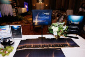 Display of Clearinghouse CDFI marketing materials and annual reports on a table at the shareholders meeting.