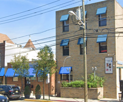Front view of Union City X-Ray Diagnostic Center with blue awnings in a commercial district