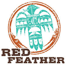 Red Feather Development Group logo featuring a stylized turquoise bird within a circular frame, symbolizing Indigenous housing partnership.