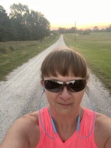 Clearinghouse CDFI Director of Impact Patricia Hansen-Horn walking remotely in support of the 2025 Walk to End Alzheimer’s.